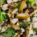 salad with pear, turkey, gorgonzola, walnuts, dried cranberries, and mixed greens