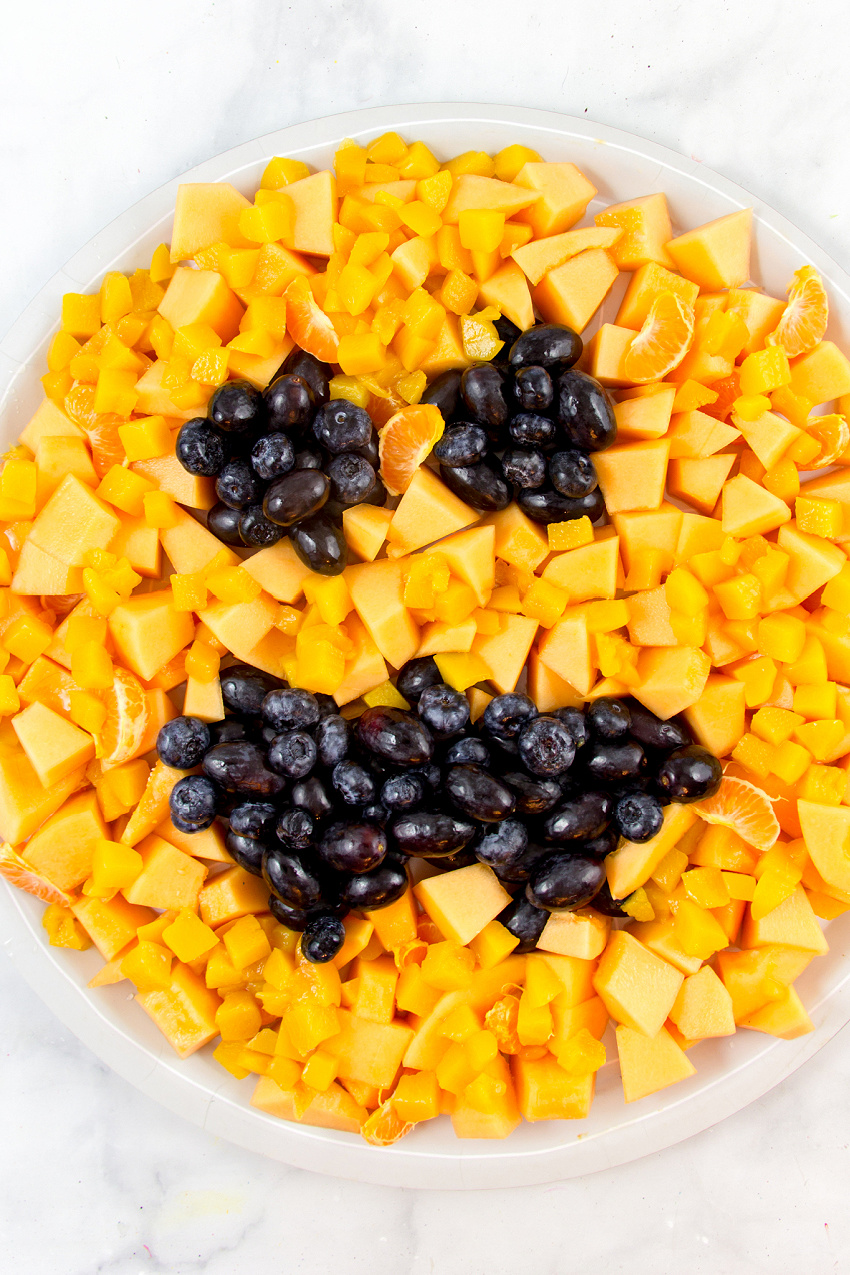 halloween fruit tray that looks like a jack o' lantern