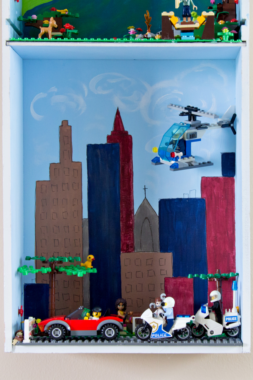 LEGO police chase displayed on a diy shelf