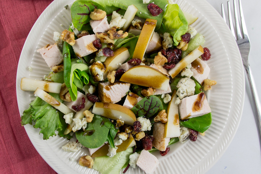 autumn pear and turkey salad with gorgonzola, walnuts, and dried cranberries
