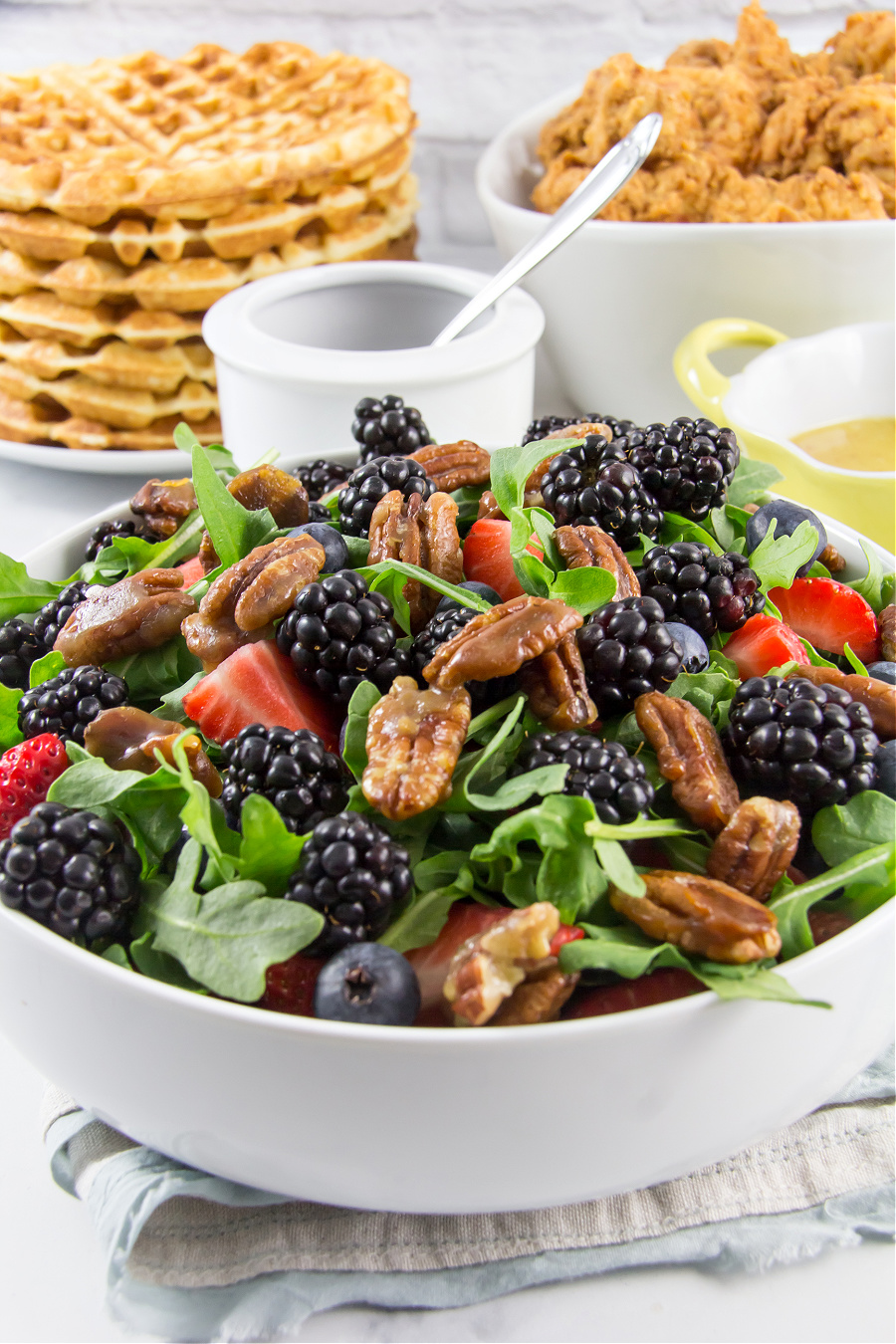 berry salad with pecans in a bowl