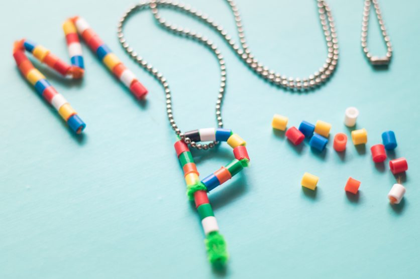 This DIY Pipe Cleaner Monogram Pendant Necklace makes the cutest favors for a birthday party. Fun and Colorful, it's sure to be a big hit with kids!