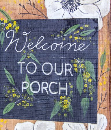 diy porch sign that is hand painted with flowers