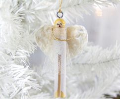 a DIY clothespin angel ornament with crocheted angel wings