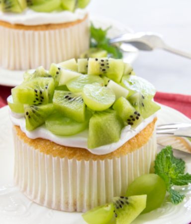 mini angel food cake with kiwi fruit and green grapes