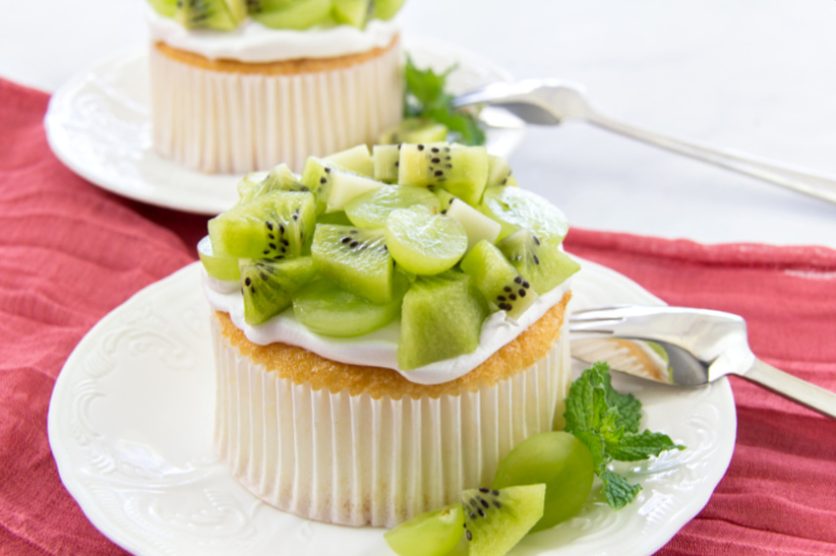 mini angel food cake with kiwi fruit and green grapes