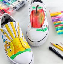 shoelaces removed from hand painted shoes and then the shoes are glue together