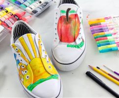 shoelaces removed from hand painted shoes and then the shoes are glue together