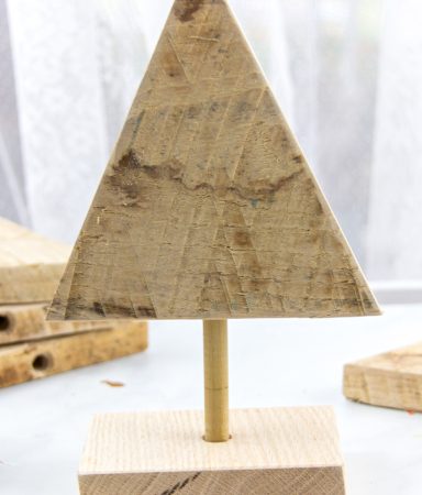 wood triangle, dowel rod and wood block used to make a tree woodcraft project for preschoolers