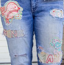 holes in womens jeans patched with embroidery