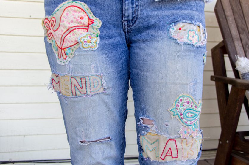 holes in womens jeans patched with embroidery