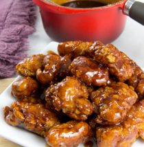 homemade boysenberry barbecue sauce on boneless chicken wings