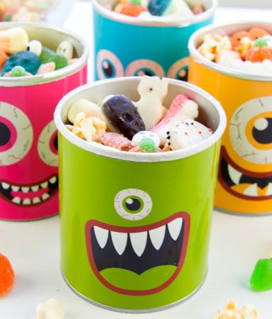 Halloween snack mix for kids put in old pringles and the good company potato chip containers