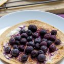 blueberries baked on a tortilla with cream cheese and cinnamon