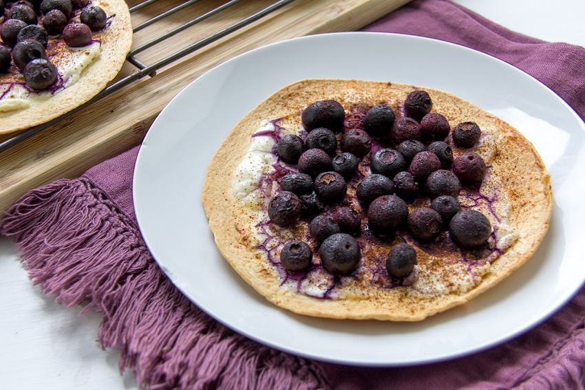 a tortilla topped with blueberries for a healthy kids breakfast