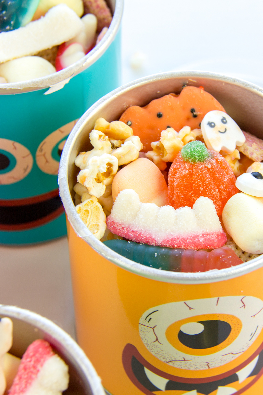 Halloween snack mix for movie nights and lunchboxes in old pringles cans