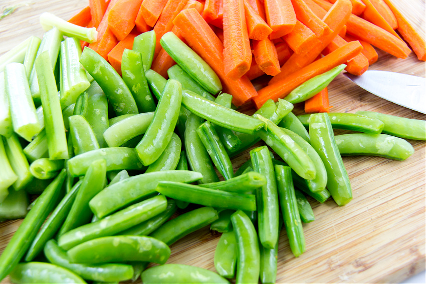sugar snap peas, celery sticks, and carrot sticks for dipping