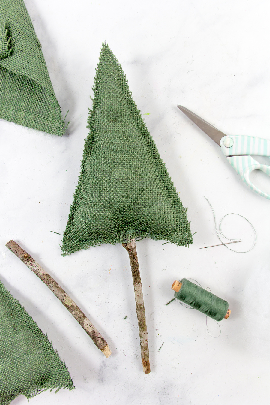 a tree craft using burlap and a stick