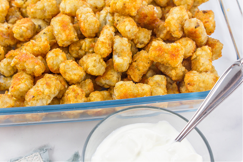 crispy tater tots in a serving dish