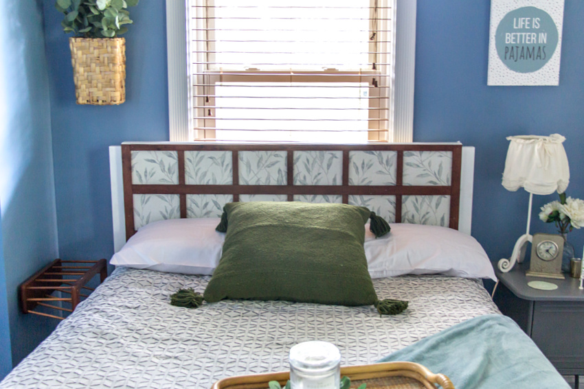 A diy wood headboard with wallpaper