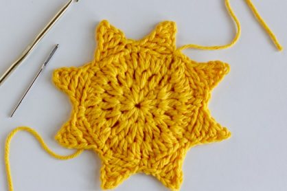 Crochet in the tails for a sun coaster