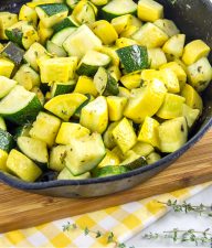 sauteed zucchini and summer squash in a cast iron skillet