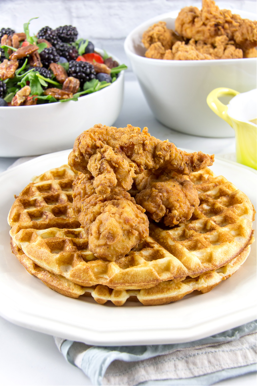 fried chicken and waffles with a berry salad for dinner