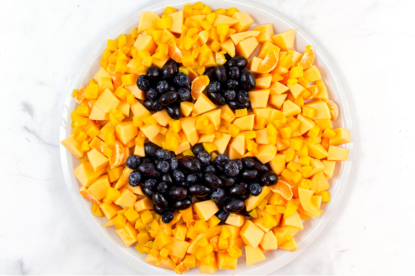 jack o'lantern fruit tray for a halloween party