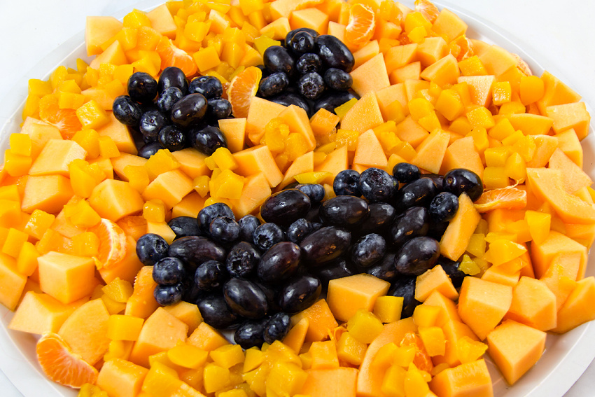 a healthy fruit tray for halloween that looks like a jack o'lantern