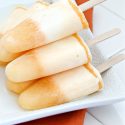 mandarin orange popsicles made with mandarins and ice cream
