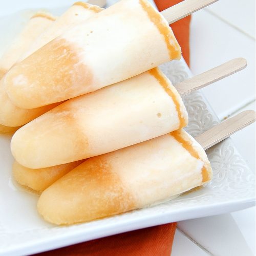 mandarin orange popsicles made with mandarins and ice cream