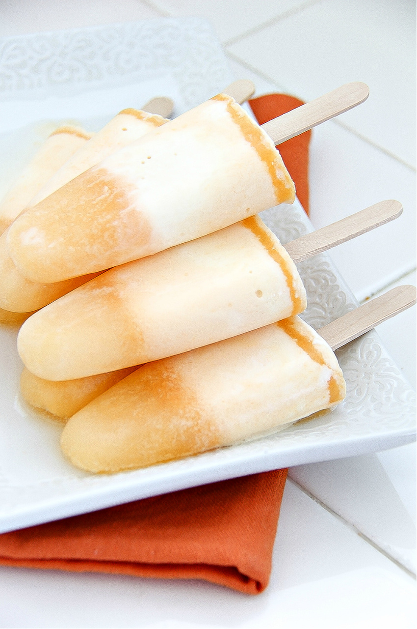 mandarin orange popsicles made with mandarins and ice cream