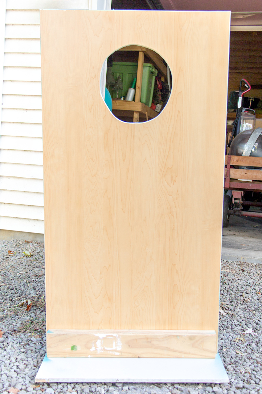 a diy photo booth board being made out of plywood