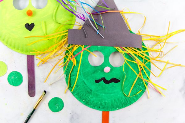 Make a Bright and Colorful Paper Plate Witch Mask - Make and Takes