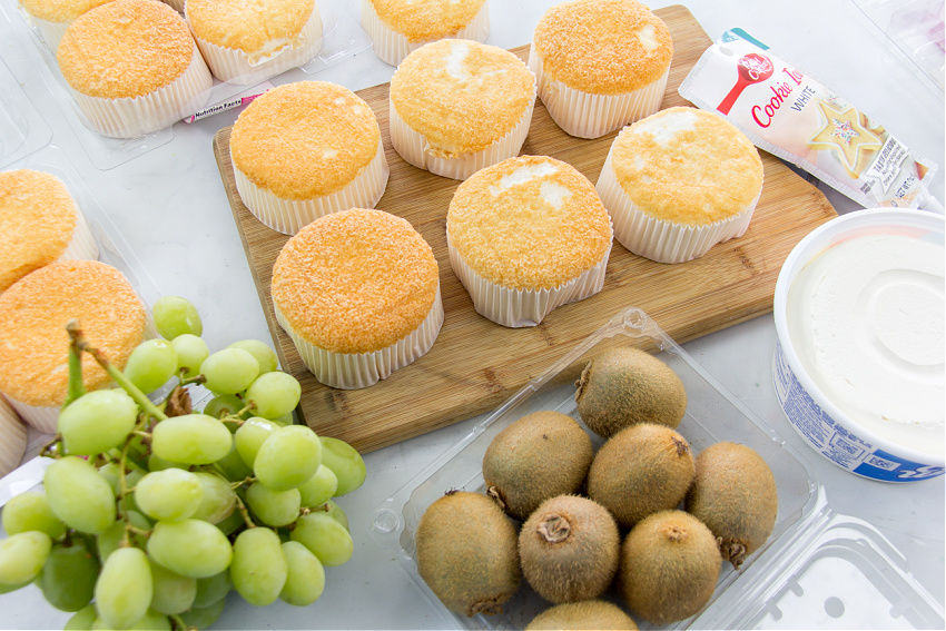 mini angel food cakes with kiwi fruit and grapes