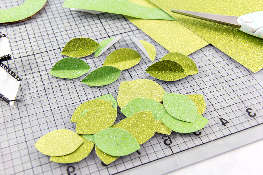 green paper leaves to make a wreath