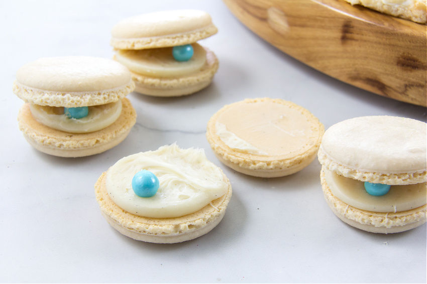 clams made out of macarons and small round chocolate candy