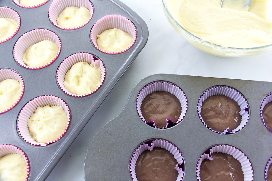 cupcake mix in liners to be baked in the oven to make ice cream cake cupcakes