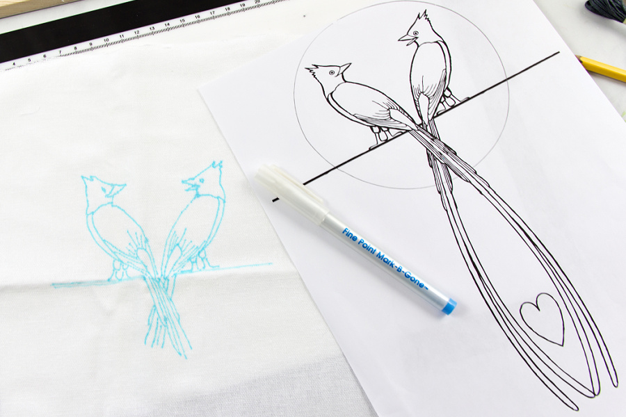 a coloring page traced onto fabric to use as an embroidery pattern