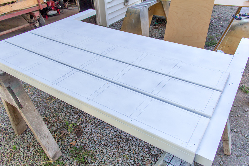 a white full size headboard used for a diy headboard project