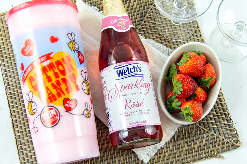 you will need Welch's sparkling rose, pink cotton candy, and strawberries to make our cotton candy mocktail