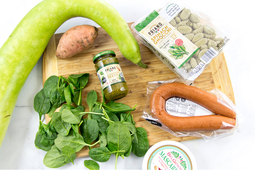 ingredients to make pesto gnocchi with sweet potato, squash, and kielbasa