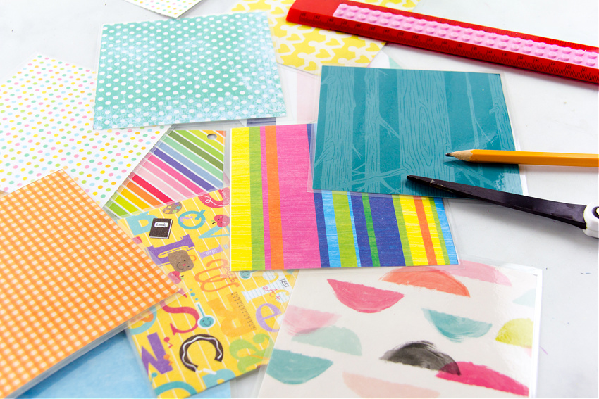 paper quilt squares for a kindness quilt made using colorful scrapbook paper 