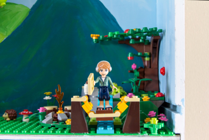 lego friends waterfall scene displayed on a shelf