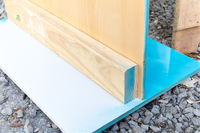 a sturdy base built for a photo booth board using plywood and a 2 x 4.