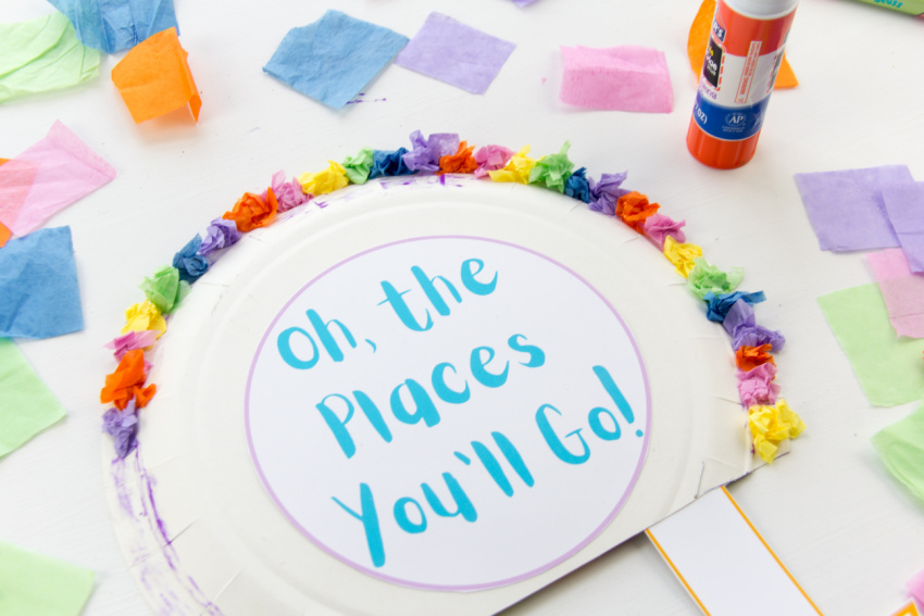 scrunched tissue paper squares glued around a paper plate hot air balloon