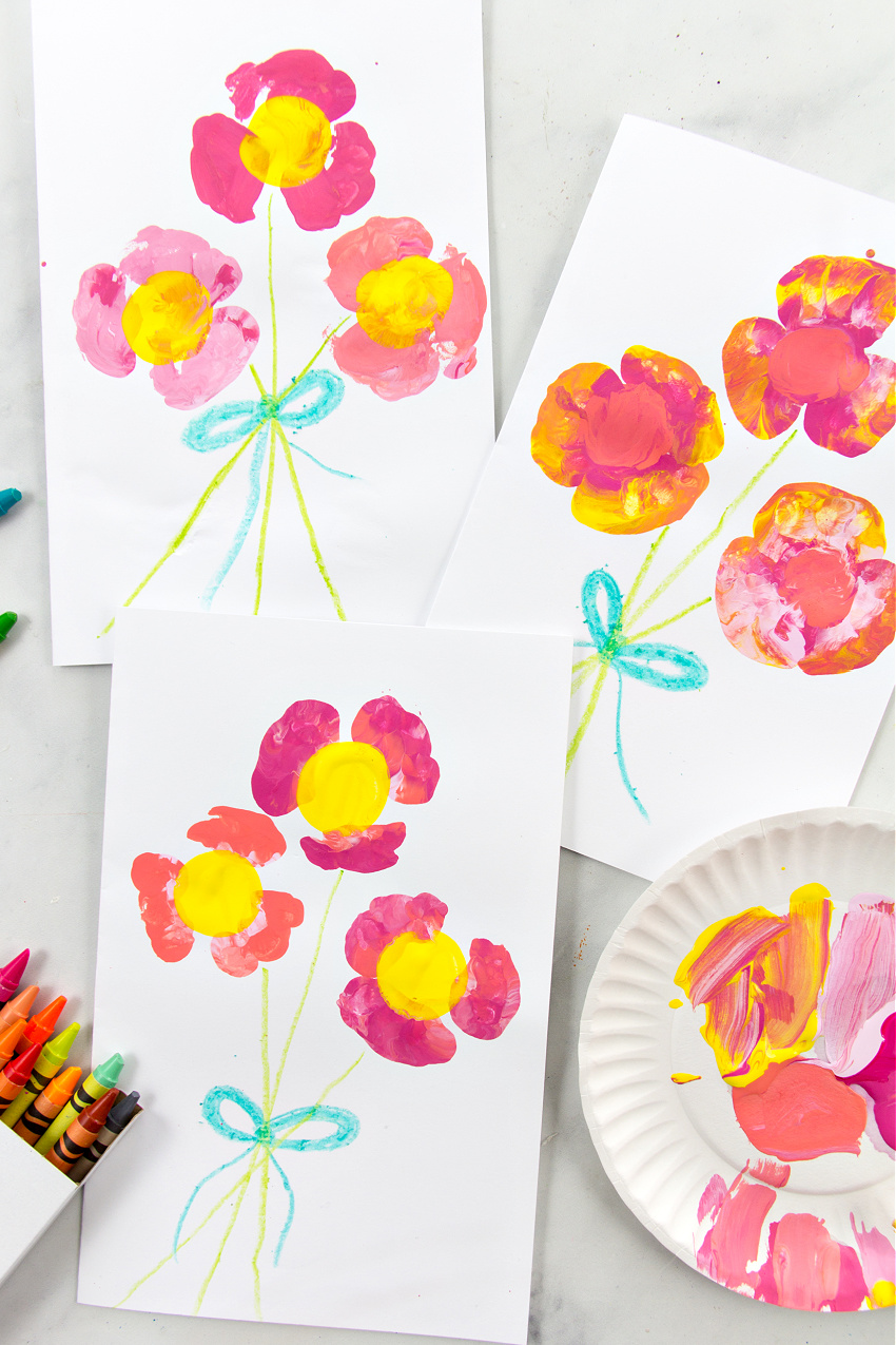 plastic bottle flowers stamped with paint onto homemade cards