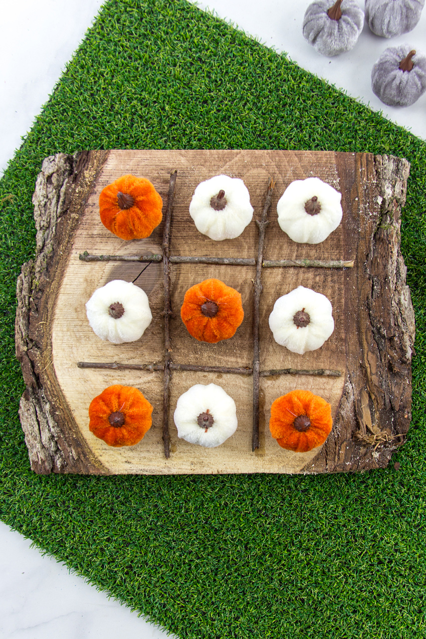 wood slice tic tac toe board diy with faux mini pumpkins