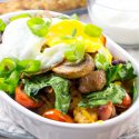 loaded tater tots recipe with bacon, sausage, egg, tomato, mushrooms, and spinach