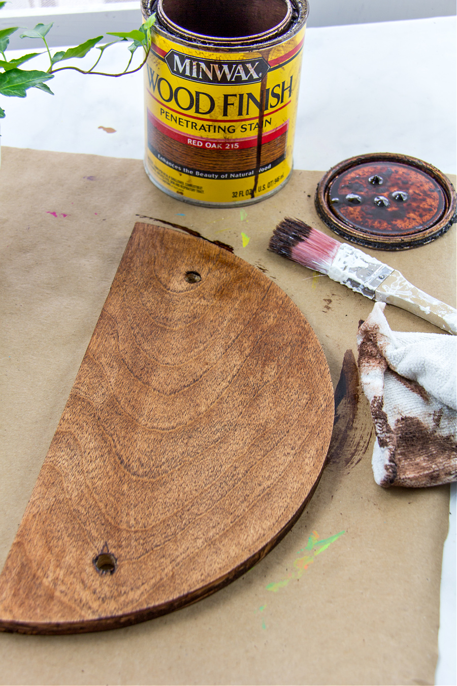 wood being stained with red oak wood stain